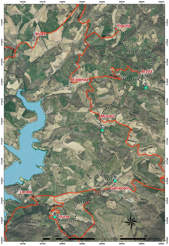 Plano del recorrido de la ruta del agua que pasa por Irurre, Garisoain, Muzqui, Arzoz y Viguria. El recorrido está trazado con una línea negra discontinua y el fondo del plano está en tonos verdes que representan la geografía del lugar.