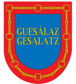 Escudo de Guesálaz en color azul y rojo con las cadenas de Navarra doradas.